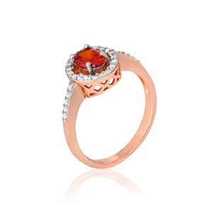 Серебряное кольцо в позолоте с красными фианитами (КК3ФГ/384)