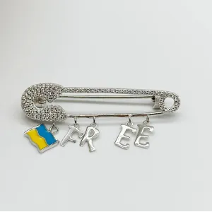 Серебряная брошь со вставкой фианит