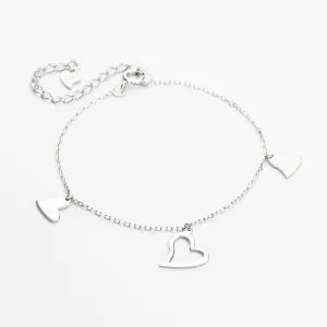 Срібний браслет з сердечками