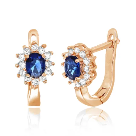Серебряные серьги в позолоте с синими и белыми фианитами цветочек